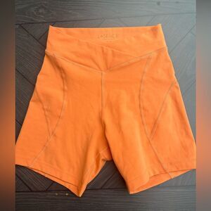 L*Space orange bike shorts, high-waisted, V front, size Med